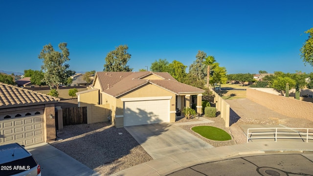 3532 W Mesquite Ave, San Tan Valley, AZ 85144 - single story home with stucco siding, a tile roof, concrete driveway, and a garage