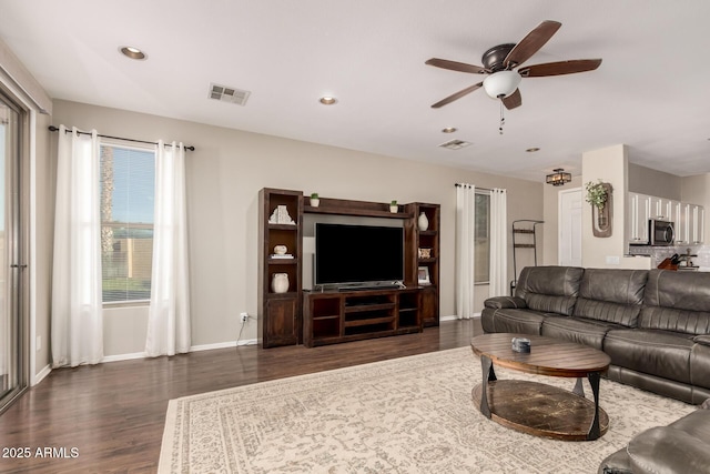 3532 W Mesquite Ave, San Tan Valley, AZ 85144 - living area featuring dark wood-style floors, a ceiling fan, and recessed lighting