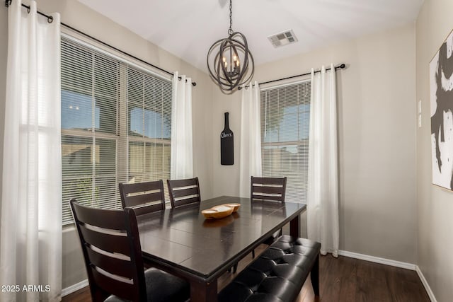 3532 W Mesquite Ave, San Tan Valley, AZ 85144 - dining area featuring a chandelier and dark wood-type flooring