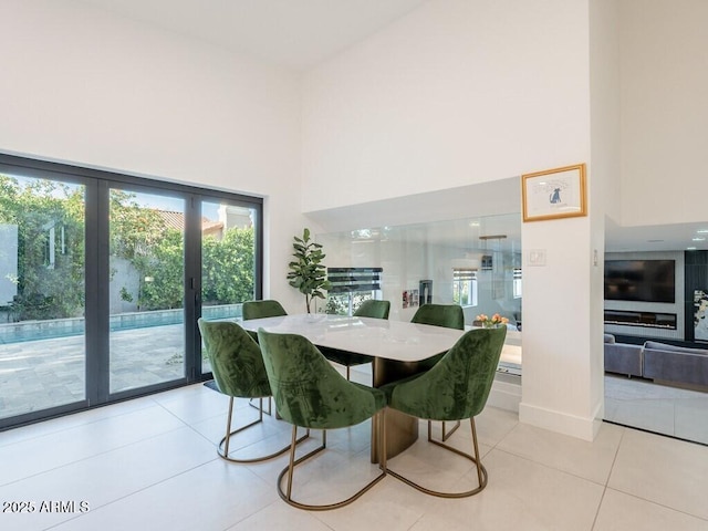 4748 E Redfield Rd, Phoenix, AZ 85032 - dining space with a high ceiling and light tile patterned floors