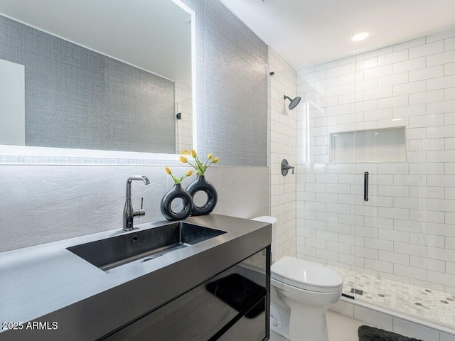 4748 E Redfield Rd, Phoenix, AZ 85032 - bathroom featuring a stall shower, toilet, tile walls, and vanity