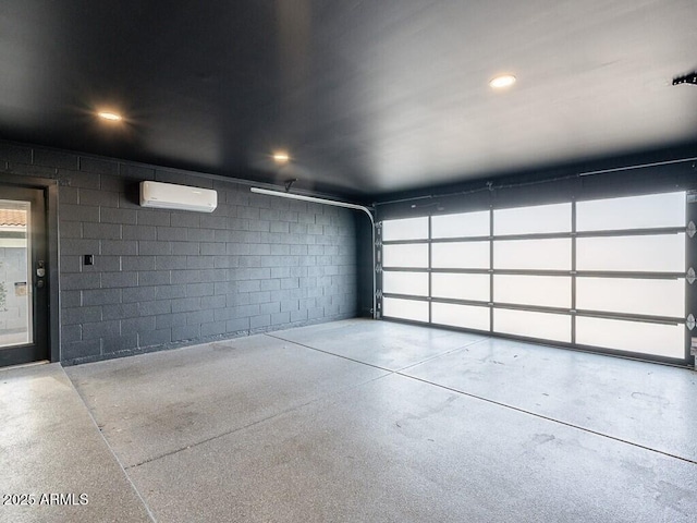 4748 E Redfield Rd, Phoenix, AZ 85032 - garage featuring an AC wall unit and concrete block wall