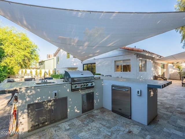 4748 E Redfield Rd, Phoenix, AZ 85032 - view of patio featuring a sink