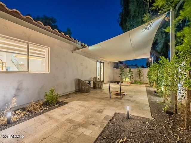 4748 E Redfield Rd, Phoenix, AZ 85032 - patio at night featuring a patio area