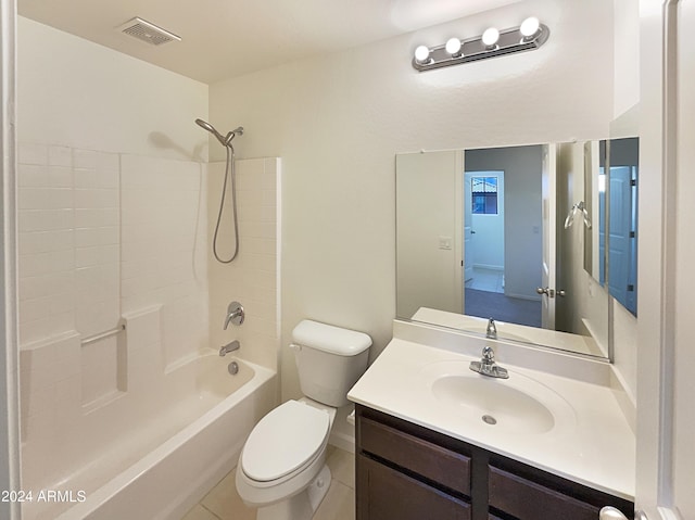 full bathroom featuring tile patterned floors, vanity, bathtub / shower combination, and toilet