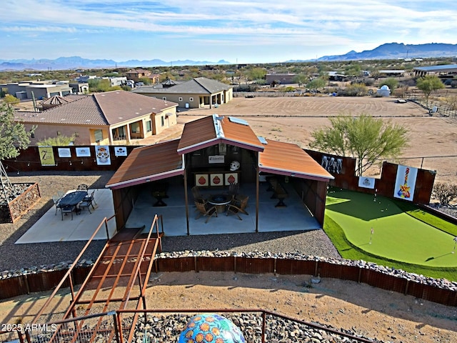 drone / aerial view featuring a mountain view