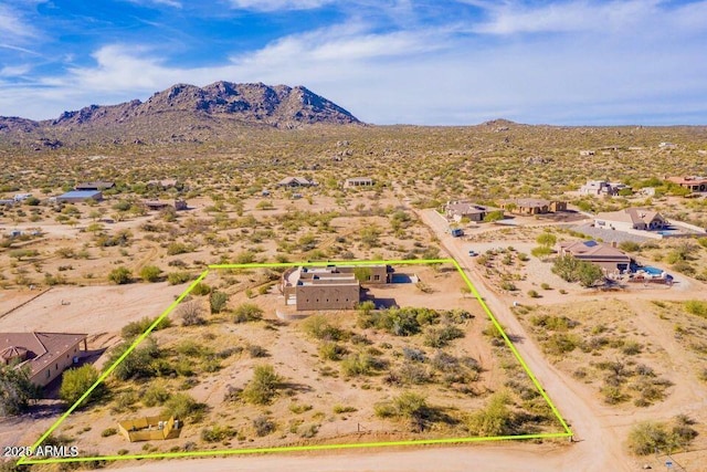 bird's eye view featuring view of desert and a mountain view