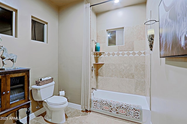 bathroom with shower / bath combination, baseboards, toilet, and tile patterned flooring