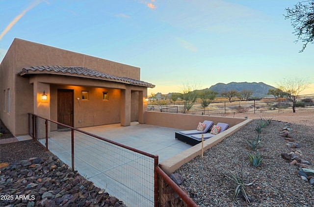 exterior space featuring a fenced backyard and a mountain view