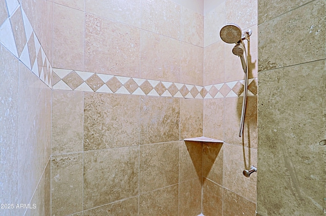 room details featuring a tile shower