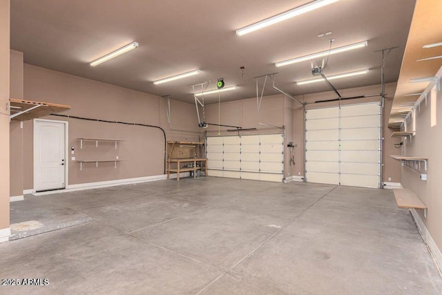 garage featuring baseboards