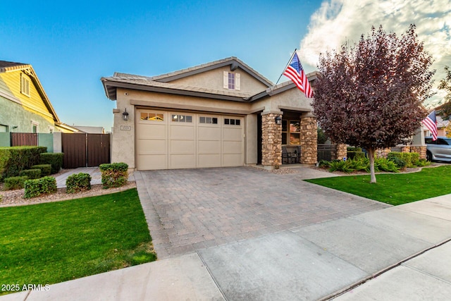 view of front facade featuring a garage and a front lawn