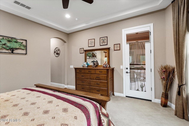 carpeted bedroom featuring access to exterior and ceiling fan