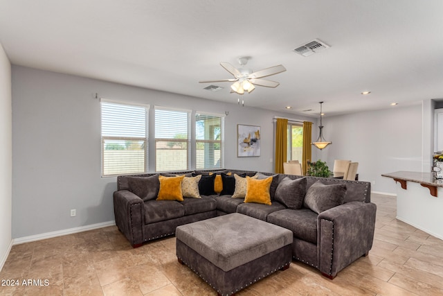 living room with ceiling fan