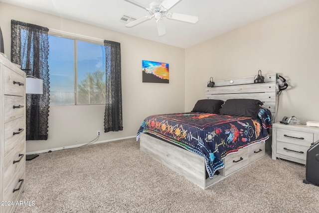 bedroom with ceiling fan and carpet floors