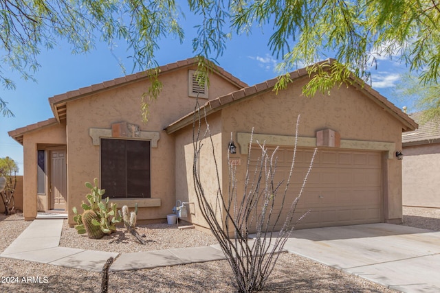 view of front of home with a garage