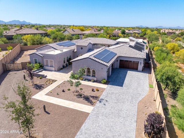 birds eye view of property with a residential view and a mountain view