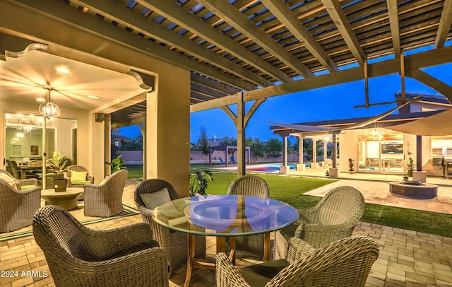 view of patio / terrace featuring an outdoor pool, an outdoor fire pit, outdoor dining area, and a pergola