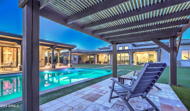 view of pool featuring a patio area and a pergola