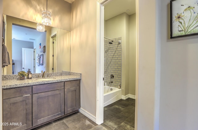 full bathroom featuring shower / bathing tub combination, vanity, and baseboards