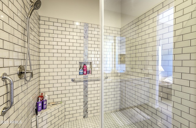 full bathroom with a shower stall