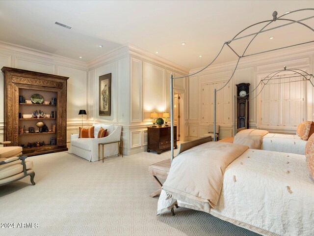 40 Biltmore Est, Phoenix, AZ 85016 - carpeted bedroom featuring a decorative wall, visible vents, and ornamental molding