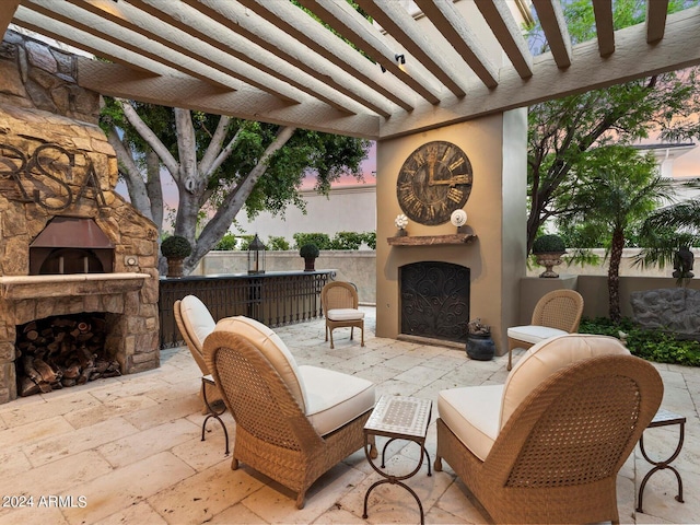 40 Biltmore Est, Phoenix, AZ 85016 - view of patio / terrace featuring an outdoor fireplace, fence, and a pergola
