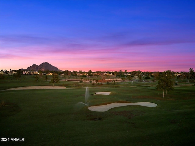 40 Biltmore Est, Phoenix, AZ 85016 - view of property's community featuring golf course view, a lawn, and a mountain view