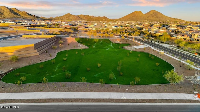 aerial view at dusk with a mountain view