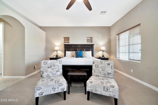 carpeted bedroom with ceiling fan