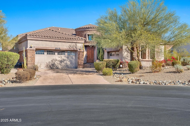 view of front of home with a garage