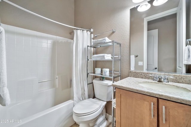 full bathroom featuring shower / bath combination with curtain, vanity, and toilet