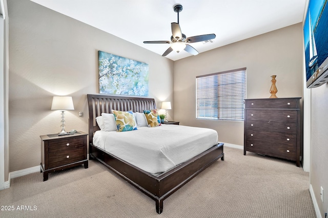 bedroom with light carpet and ceiling fan