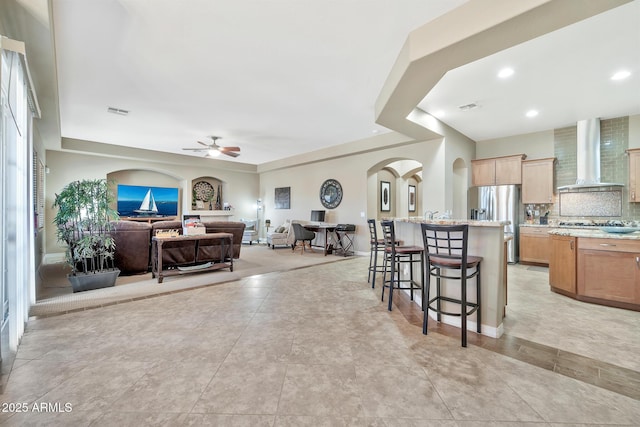 living room with ceiling fan