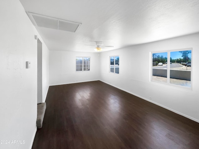 spare room featuring ceiling fan and wood-type flooring