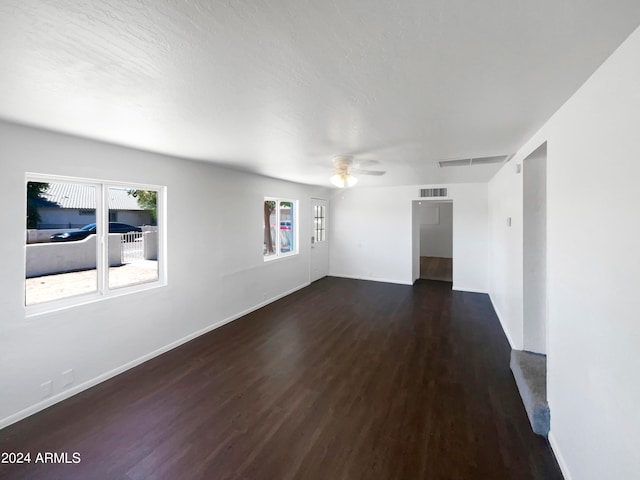 unfurnished room with hardwood / wood-style floors and ceiling fan