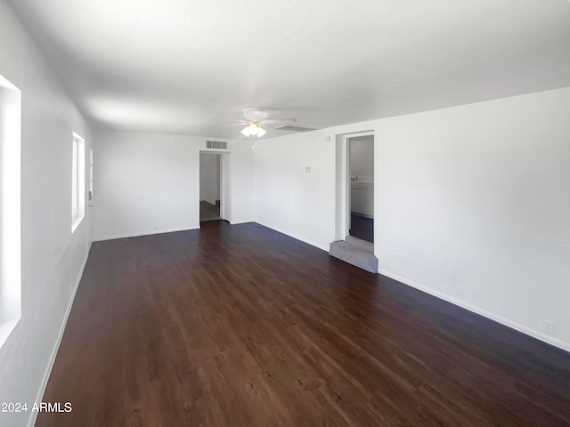 empty room with ceiling fan and wood-type flooring