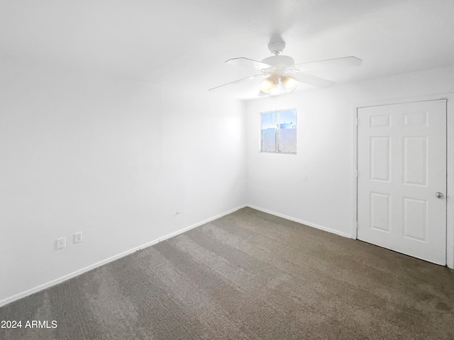 unfurnished room featuring carpet floors and ceiling fan