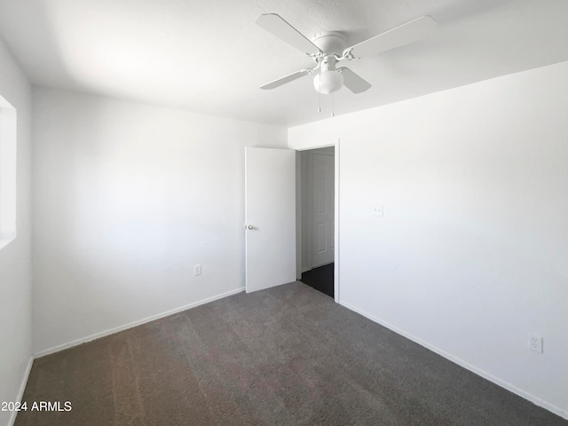 unfurnished room featuring carpet floors and ceiling fan