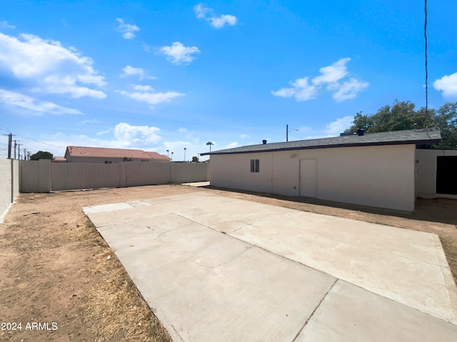 rear view of property with a patio