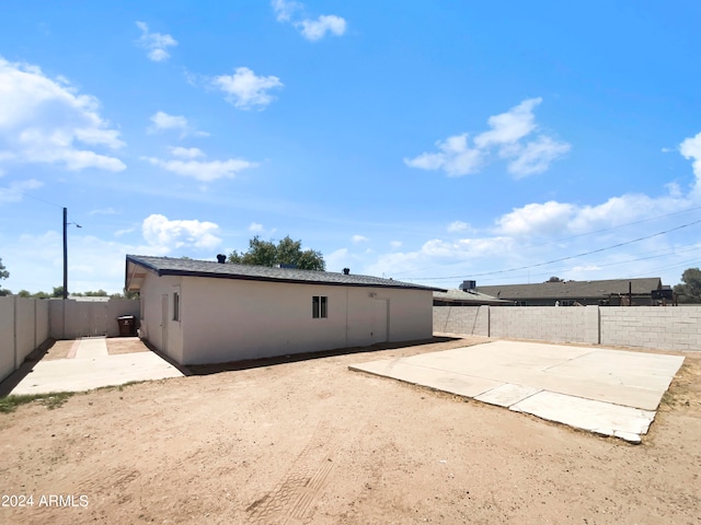 back of house featuring a patio