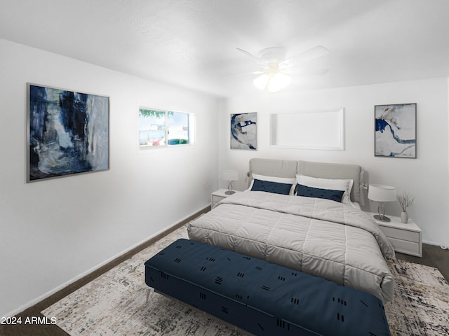 bedroom with ceiling fan and carpet floors