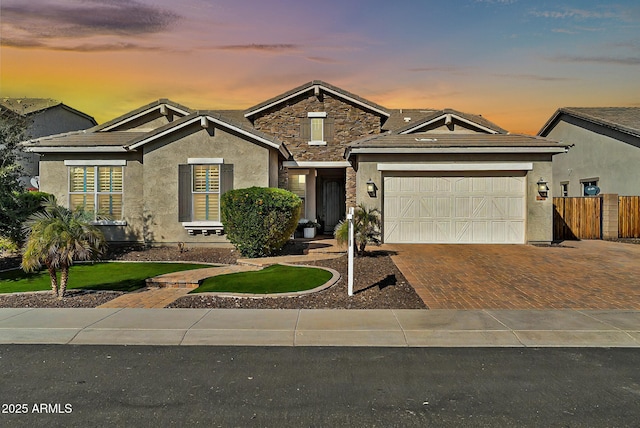 view of front of property featuring a garage