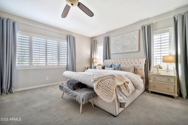 bedroom with ceiling fan and light colored carpet