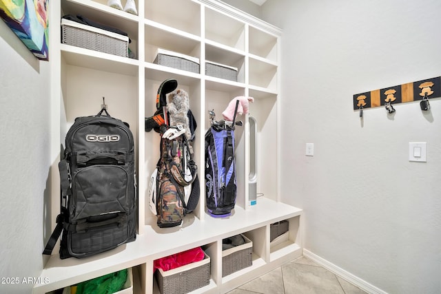 mudroom with light tile patterned flooring