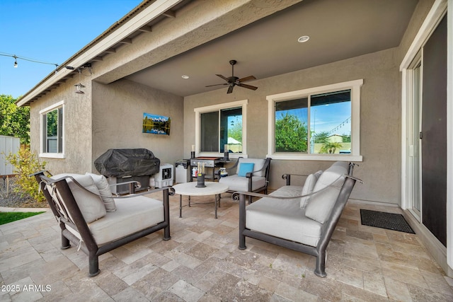 view of patio / terrace featuring an outdoor living space, a grill, and ceiling fan