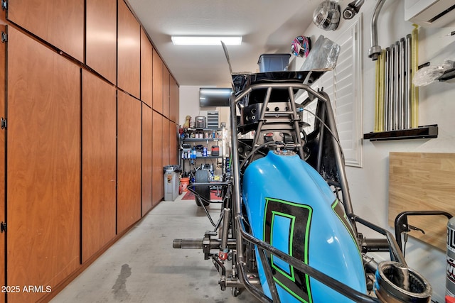 interior space with a wall mounted air conditioner