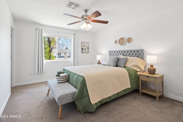 carpeted bedroom with ceiling fan