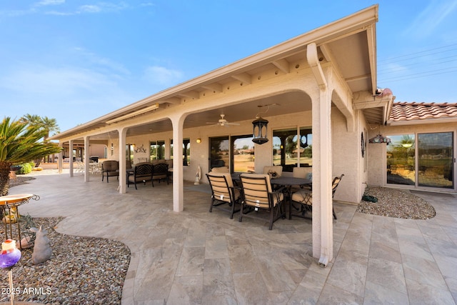 view of patio / terrace featuring ceiling fan and outdoor dining area