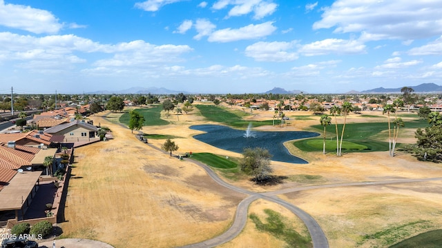 bird's eye view featuring golf course view and a mountain view